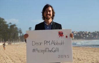 Crowdfunding Liquidity Lockup Compared Jody Lightfoot on Manly Beach as Common Grace ask PM Tony Abbott to #acceptthegift of solar for Kirribilli House