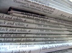 Real Estate Crowdfunding Tax Treatment A stack of newspapers
