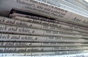 Real Estate Crowdfunding Tax Treatment A stack of newspapers