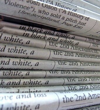 Real Estate Crowdfunding Tax Treatment A stack of newspapers